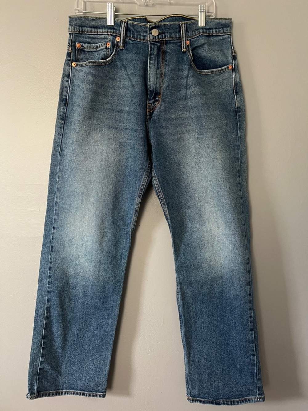 569 Levi's Men's Straight Jeans in Faded Blue Denim